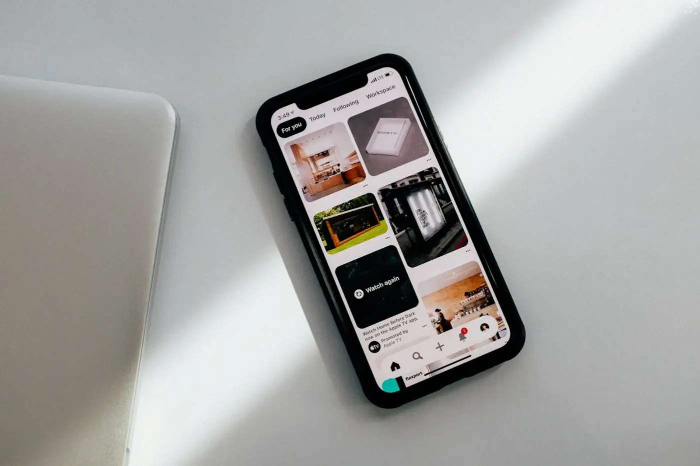Smartphone running an app on a desk