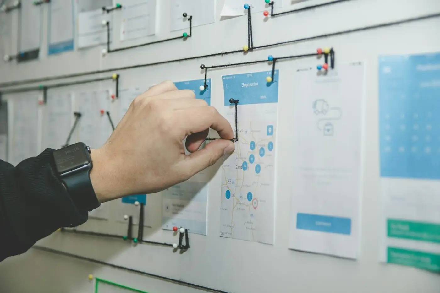 Website wireframes on a wall